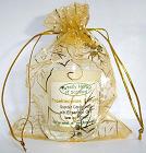  The three wise men Gold organza gift bag,
 with a Frankincense and Myrrh candle in a glass. 